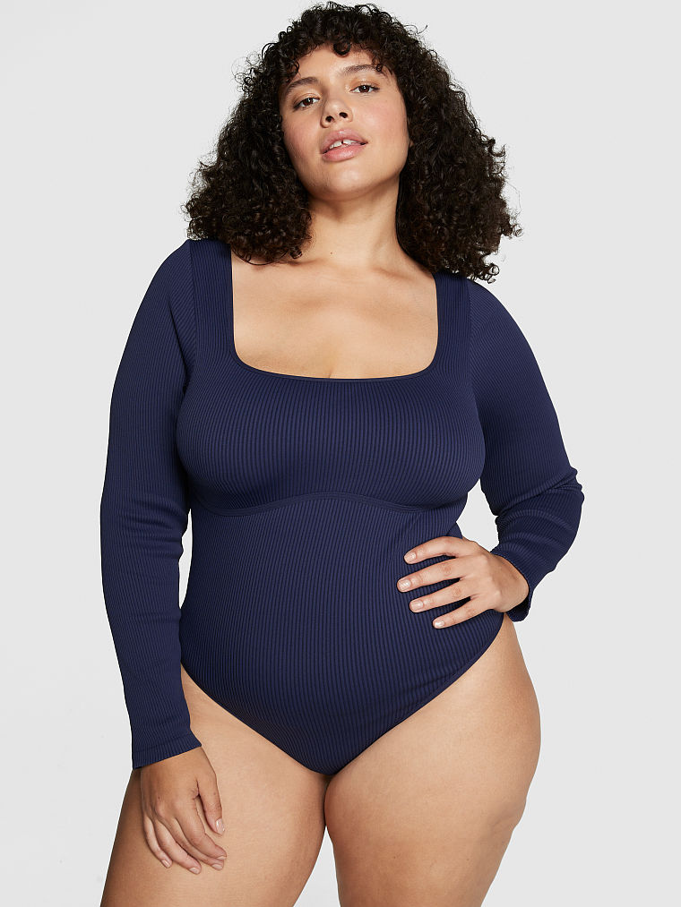 Buy Pink Seamless Rib Long Sleeve Bodysuit online in Dubai